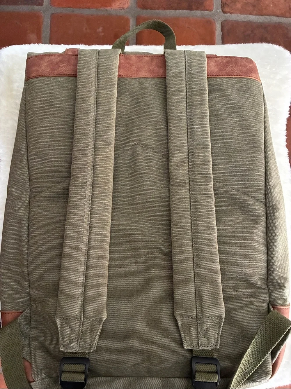 FOSTER & RYE insulated cooler wine backpack in olive green and brown.